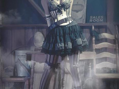 This custom waist-training corset was designed and created by Castle Corsetry. 	