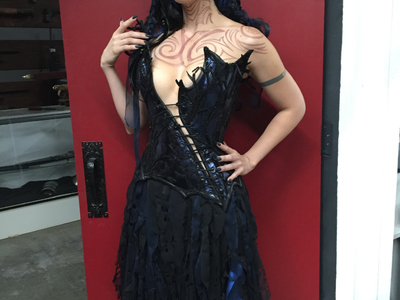 This original sea witch costume was designed and fabricated by Castle Corsetry for a swashbuckling film. 	