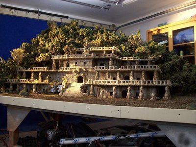 This 1/24th scale sculpted and cast ancient temple ruins set in the Southwest Asian jungle shooting miniature was designed and fabricated for MORAV. 	