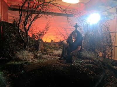 This is our pop-up set of a surreal, reconfigurable, forced perspective cemetery set with painted sky backdrop. 	